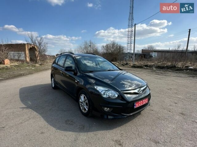 Черный Хендай i30, объемом двигателя 1.4 л и пробегом 240 тыс. км за 6600 $, фото 1 на Automoto.ua
