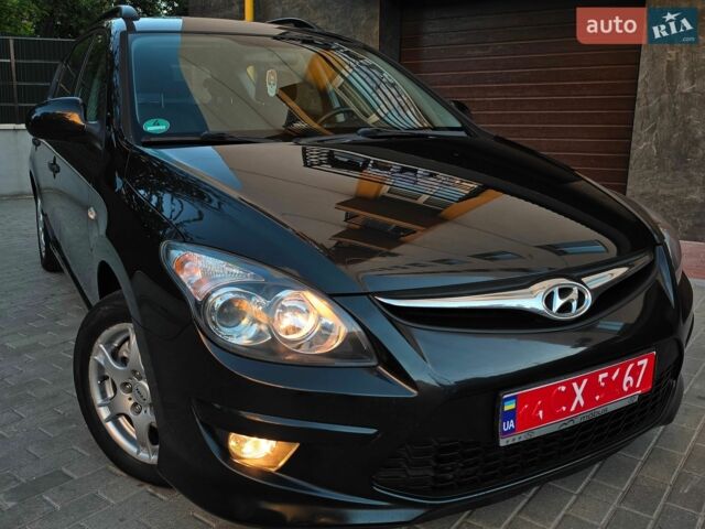 Черный Хендай i30, объемом двигателя 1.6 л и пробегом 190 тыс. км за 7099 $, фото 1 на Automoto.ua