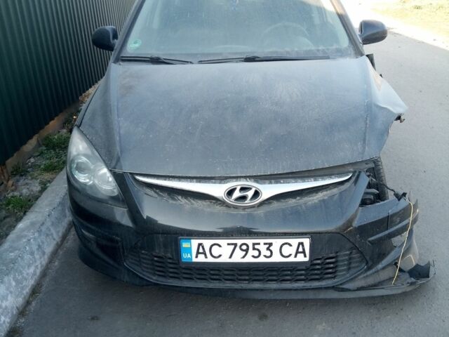 Черный Хендай i30, объемом двигателя 1.58 л и пробегом 218 тыс. км за 3340 $, фото 1 на Automoto.ua