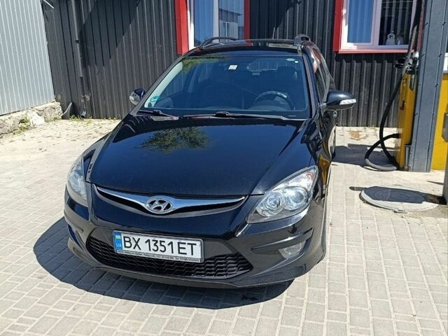 Черный Хендай i30, объемом двигателя 1.58 л и пробегом 210 тыс. км за 7500 $, фото 1 на Automoto.ua
