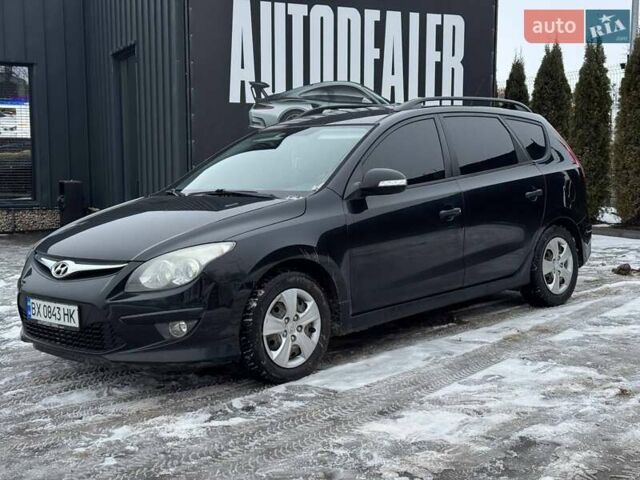 Черный Хендай i30, объемом двигателя 1.58 л и пробегом 218 тыс. км за 6500 $, фото 1 на Automoto.ua