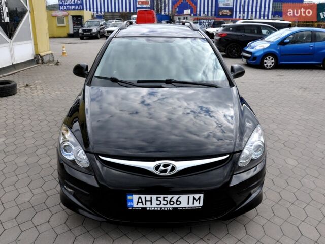 Черный Хендай i30, объемом двигателя 1.6 л и пробегом 240 тыс. км за 7500 $, фото 1 на Automoto.ua