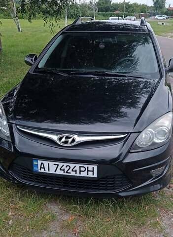 Чорний Хендай i30, об'ємом двигуна 1.59 л та пробігом 145 тис. км за 6499 $, фото 1 на Automoto.ua