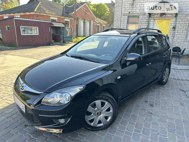 Чорний Хендай i30, об'ємом двигуна 1.58 л та пробігом 175 тис. км за 7500 $, фото 1 на Automoto.ua