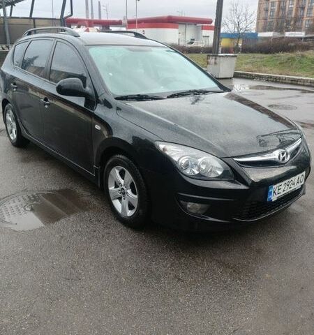 Черный Хендай i30, объемом двигателя 1.58 л и пробегом 213 тыс. км за 6899 $, фото 1 на Automoto.ua