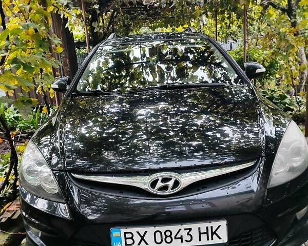 Черный Хендай i30, объемом двигателя 1.58 л и пробегом 210 тыс. км за 7500 $, фото 1 на Automoto.ua
