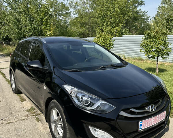Чорний Хендай i30, об'ємом двигуна 1.6 л та пробігом 167 тис. км за 8200 $, фото 1 на Automoto.ua