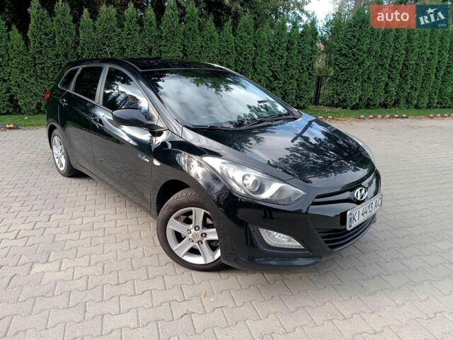 Черный Хендай i30, объемом двигателя 1.4 л и пробегом 346 тыс. км за 7700 $, фото 1 на Automoto.ua