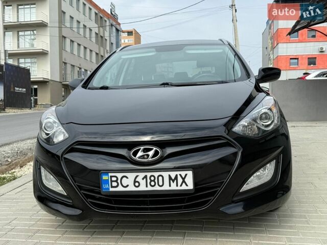 Черный Хендай i30, объемом двигателя 1.6 л и пробегом 310 тыс. км за 6999 $, фото 1 на Automoto.ua