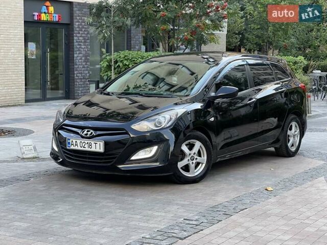 Черный Хендай i30, объемом двигателя 1.58 л и пробегом 153 тыс. км за 9500 $, фото 1 на Automoto.ua