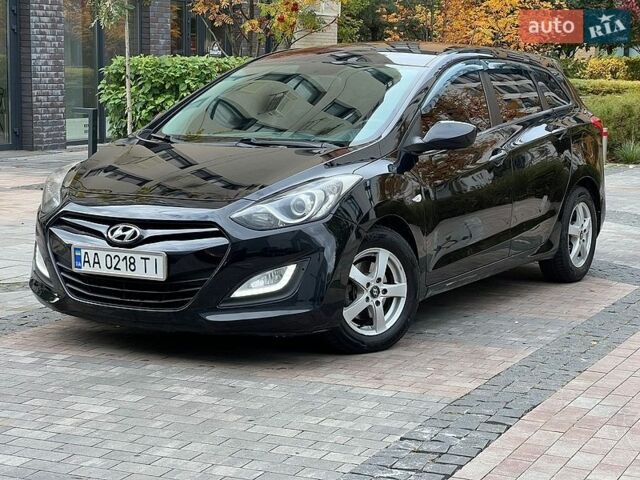 Черный Хендай i30, объемом двигателя 1.58 л и пробегом 153 тыс. км за 8500 $, фото 1 на Automoto.ua