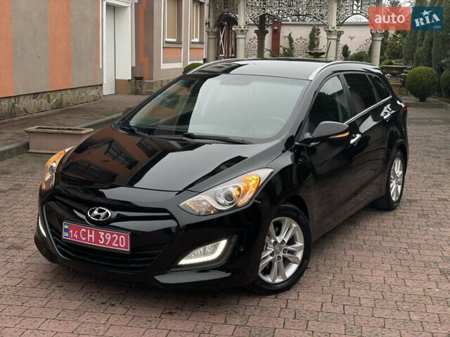 Чорний Хендай i30, об'ємом двигуна 1.6 л та пробігом 221 тис. км за 8650 $, фото 1 на Automoto.ua