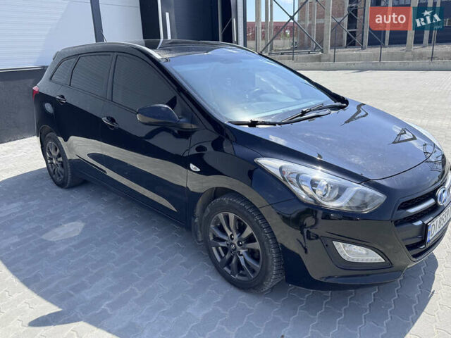 Черный Хендай i30, объемом двигателя 1.4 л и пробегом 283 тыс. км за 9500 $, фото 1 на Automoto.ua