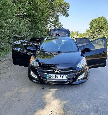 Чорний Хендай i30, об'ємом двигуна 1.4 л та пробігом 236 тис. км за 10400 $, фото 1 на Automoto.ua