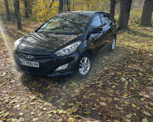 Черный Хендай i30, объемом двигателя 1.58 л и пробегом 290 тыс. км за 10800 $, фото 1 на Automoto.ua
