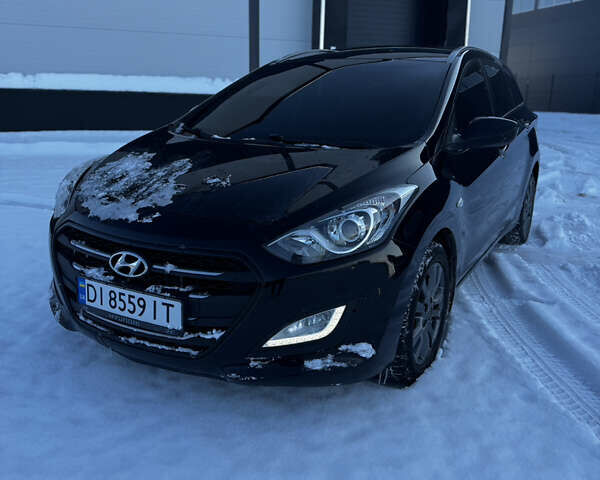 Черный Хендай i30, объемом двигателя 1.4 л и пробегом 293 тыс. км за 8300 $, фото 1 на Automoto.ua