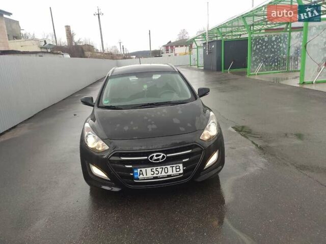 Черный Хендай i30, объемом двигателя 1.6 л и пробегом 245 тыс. км за 12100 $, фото 1 на Automoto.ua