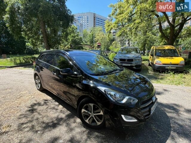 Черный Хендай i30, объемом двигателя 1.58 л и пробегом 255 тыс. км за 8900 $, фото 1 на Automoto.ua