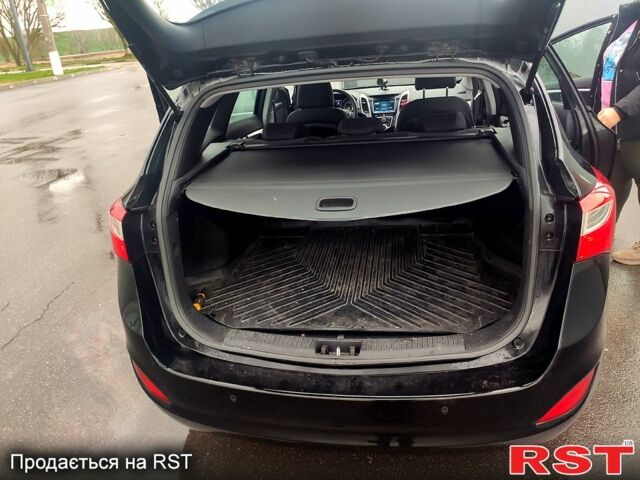 Черный Хендай i30, объемом двигателя 1.6 л и пробегом 239 тыс. км за 12500 $, фото 1 на Automoto.ua