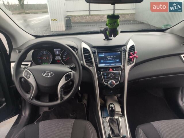 Черный Хендай i30, объемом двигателя 1.6 л и пробегом 245 тыс. км за 12100 $, фото 1 на Automoto.ua