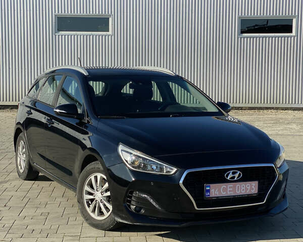 Черный Хендай i30, объемом двигателя 1.6 л и пробегом 223 тыс. км за 11000 $, фото 1 на Automoto.ua
