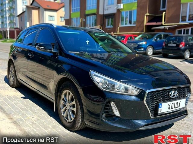 Черный Хендай i30, объемом двигателя 1.6 л и пробегом 275 тыс. км за 12000 $, фото 1 на Automoto.ua