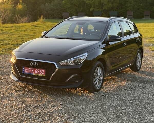 Чорний Хендай i30, об'ємом двигуна 1.59 л та пробігом 227 тис. км за 12500 $, фото 1 на Automoto.ua