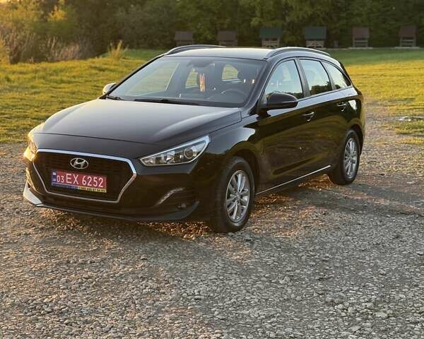 Черный Хендай i30, объемом двигателя 1.59 л и пробегом 228 тыс. км за 12300 $, фото 1 на Automoto.ua