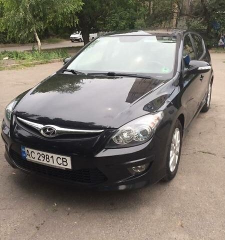 Черный Хендай i30, объемом двигателя 1.6 л и пробегом 119 тыс. км за 8850 $, фото 1 на Automoto.ua