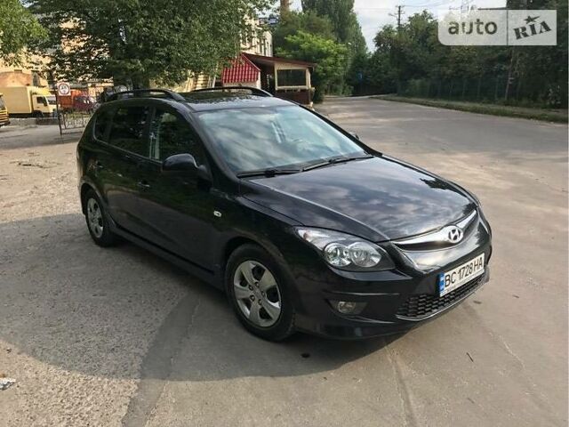 Черный Хендай i30, объемом двигателя 1.6 л и пробегом 157 тыс. км за 7900 $, фото 1 на Automoto.ua