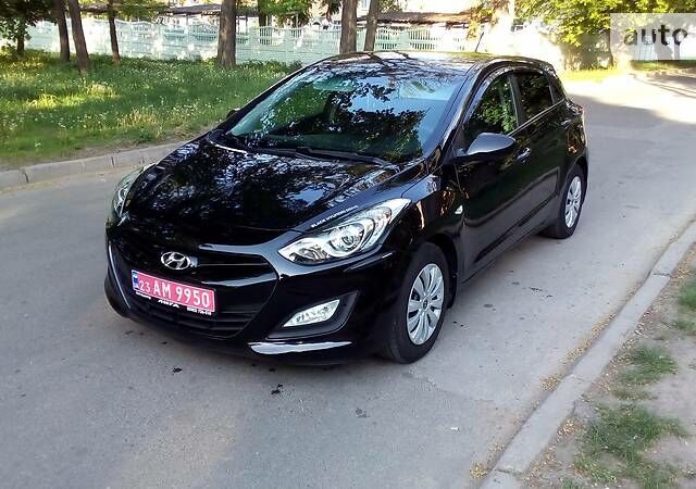 Черный Хендай i30, объемом двигателя 1.4 л и пробегом 67 тыс. км за 10200 $, фото 1 на Automoto.ua