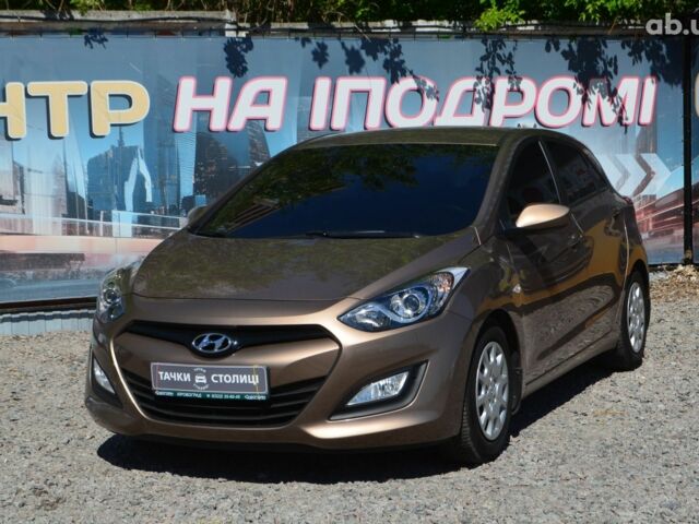 Коричневый Хендай i30, объемом двигателя 1.6 л и пробегом 65 тыс. км за 11300 $, фото 1 на Automoto.ua