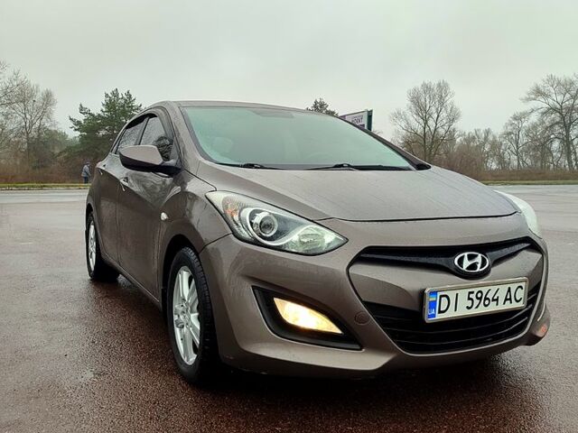 Коричневый Хендай i30, объемом двигателя 1.4 л и пробегом 130 тыс. км за 6999 $, фото 1 на Automoto.ua