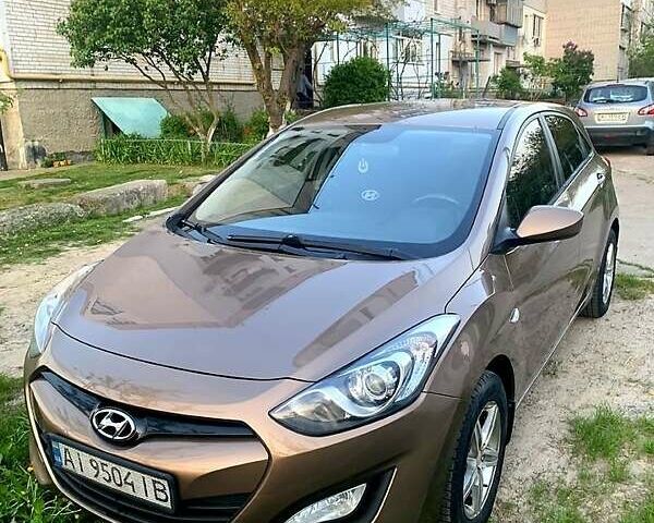 Коричневий Хендай i30, об'ємом двигуна 1.5 л та пробігом 158 тис. км за 7500 $, фото 1 на Automoto.ua