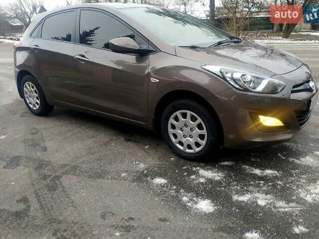 Коричневый Хендай i30, объемом двигателя 1.4 л и пробегом 170 тыс. км за 8800 $, фото 1 на Automoto.ua