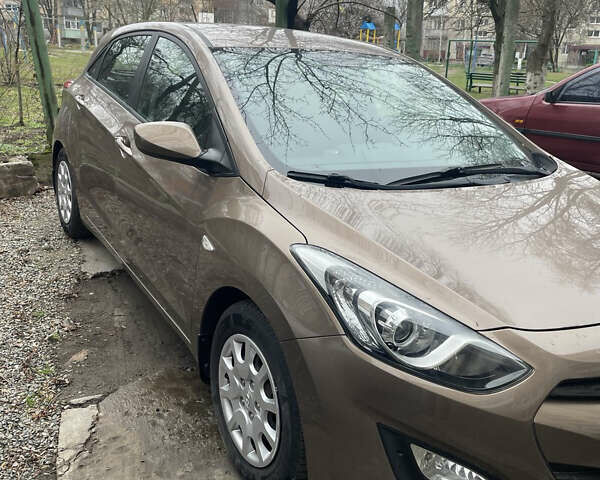 Коричневый Хендай i30, объемом двигателя 1.4 л и пробегом 47 тыс. км за 10499 $, фото 1 на Automoto.ua