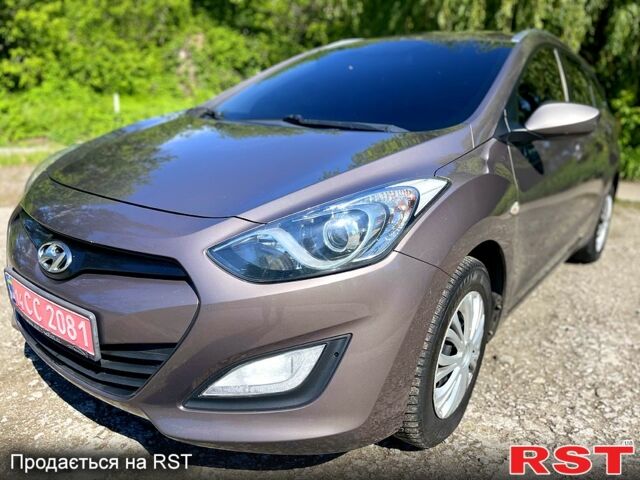 Коричневий Хендай i30, об'ємом двигуна 1.6 л та пробігом 251 тис. км за 8900 $, фото 1 на Automoto.ua