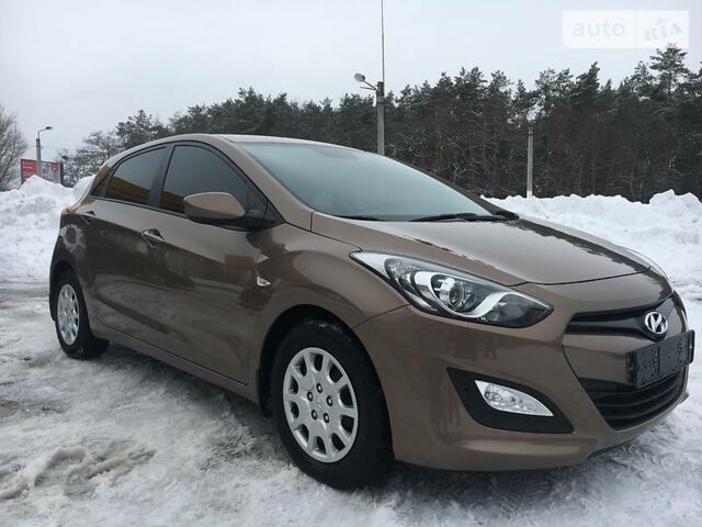 Коричневий Хендай i30, об'ємом двигуна 1.6 л та пробігом 57 тис. км за 12800 $, фото 1 на Automoto.ua