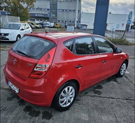 Червоний Хендай i30, об'ємом двигуна 1.4 л та пробігом 197 тис. км за 4047 $, фото 1 на Automoto.ua
