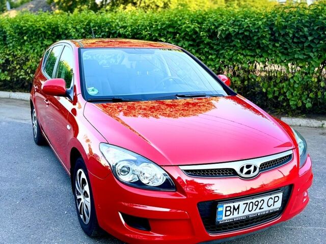 Червоний Хендай i30, об'ємом двигуна 1.4 л та пробігом 194 тис. км за 5500 $, фото 1 на Automoto.ua