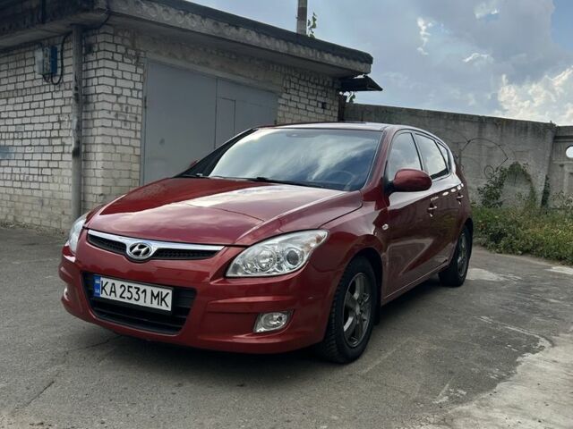 Красный Хендай i30, объемом двигателя 1.6 л и пробегом 186 тыс. км за 6349 $, фото 1 на Automoto.ua