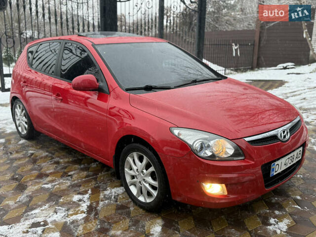 Красный Хендай i30, объемом двигателя 1.59 л и пробегом 163 тыс. км за 6500 $, фото 1 на Automoto.ua