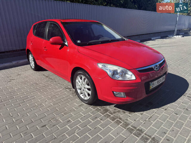 Красный Хендай i30, объемом двигателя 1.6 л и пробегом 159 тыс. км за 7399 $, фото 1 на Automoto.ua