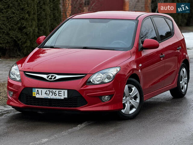 Красный Хендай i30, объемом двигателя 1.59 л и пробегом 84 тыс. км за 9400 $, фото 1 на Automoto.ua