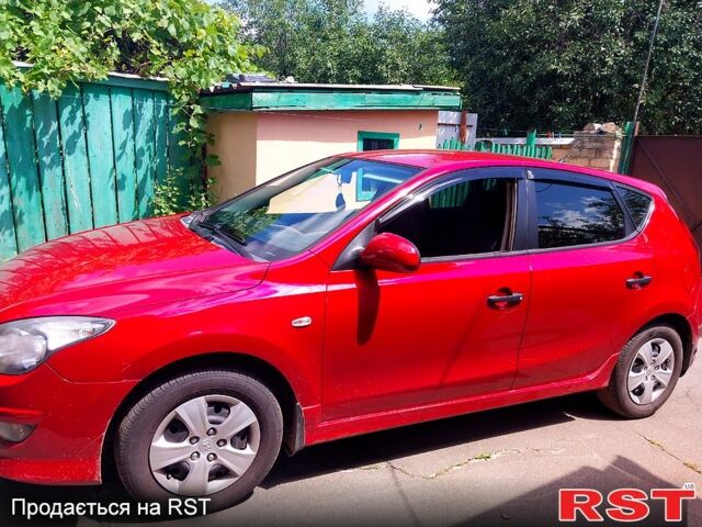 Червоний Хендай i30, об'ємом двигуна 1.4 л та пробігом 120 тис. км за 6700 $, фото 1 на Automoto.ua