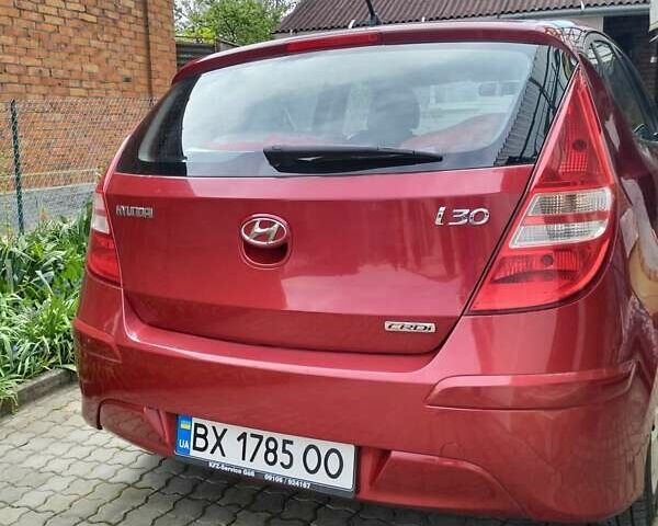 Красный Хендай i30, объемом двигателя 1.58 л и пробегом 186 тыс. км за 6500 $, фото 1 на Automoto.ua