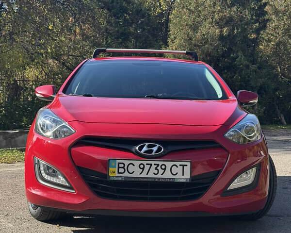 Червоний Хендай i30, об'ємом двигуна 1.59 л та пробігом 61 тис. км за 13000 $, фото 1 на Automoto.ua
