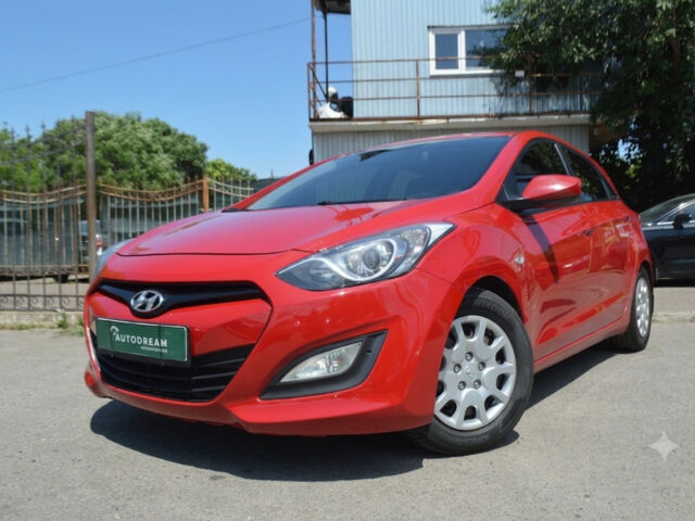Червоний Хендай i30, об'ємом двигуна 1.4 л та пробігом 134 тис. км за 6499 $, фото 1 на Automoto.ua
