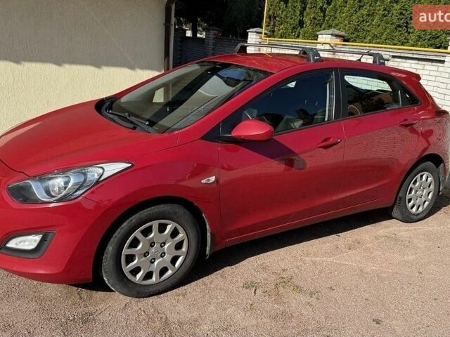 Красный Хендай i30, объемом двигателя 1.59 л и пробегом 205 тыс. км за 8200 $, фото 1 на Automoto.ua