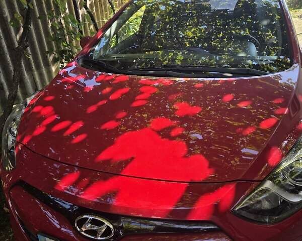 Красный Хендай i30, объемом двигателя 1.4 л и пробегом 33 тыс. км за 13000 $, фото 1 на Automoto.ua